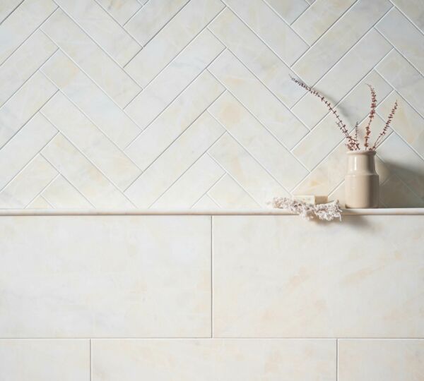 Calacatta-Amber-Marble-Tiles-Herringbone-Bathroom