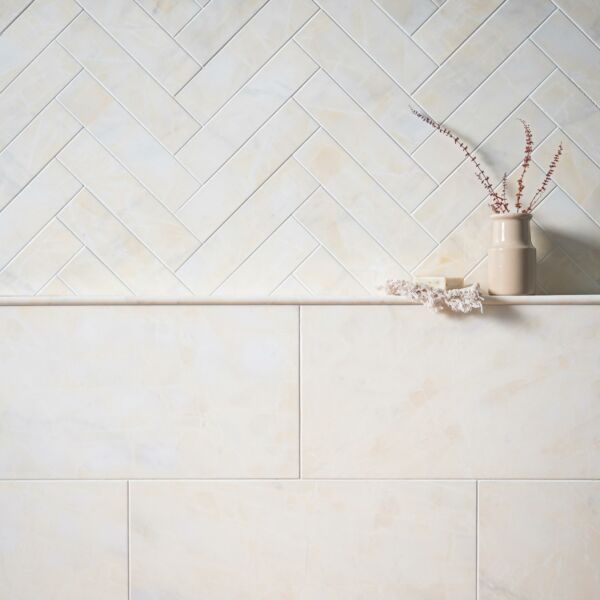 Calacatta-Amber-Marble-Tiles-Herringbone-Bathroom